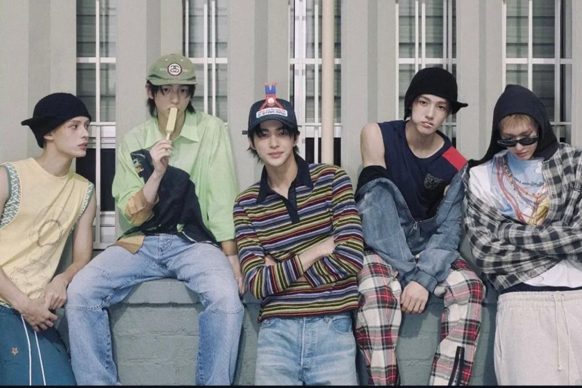 CORTIS members in varied hats, loose denim, plaid layers, and unresolved streetwear proportions.